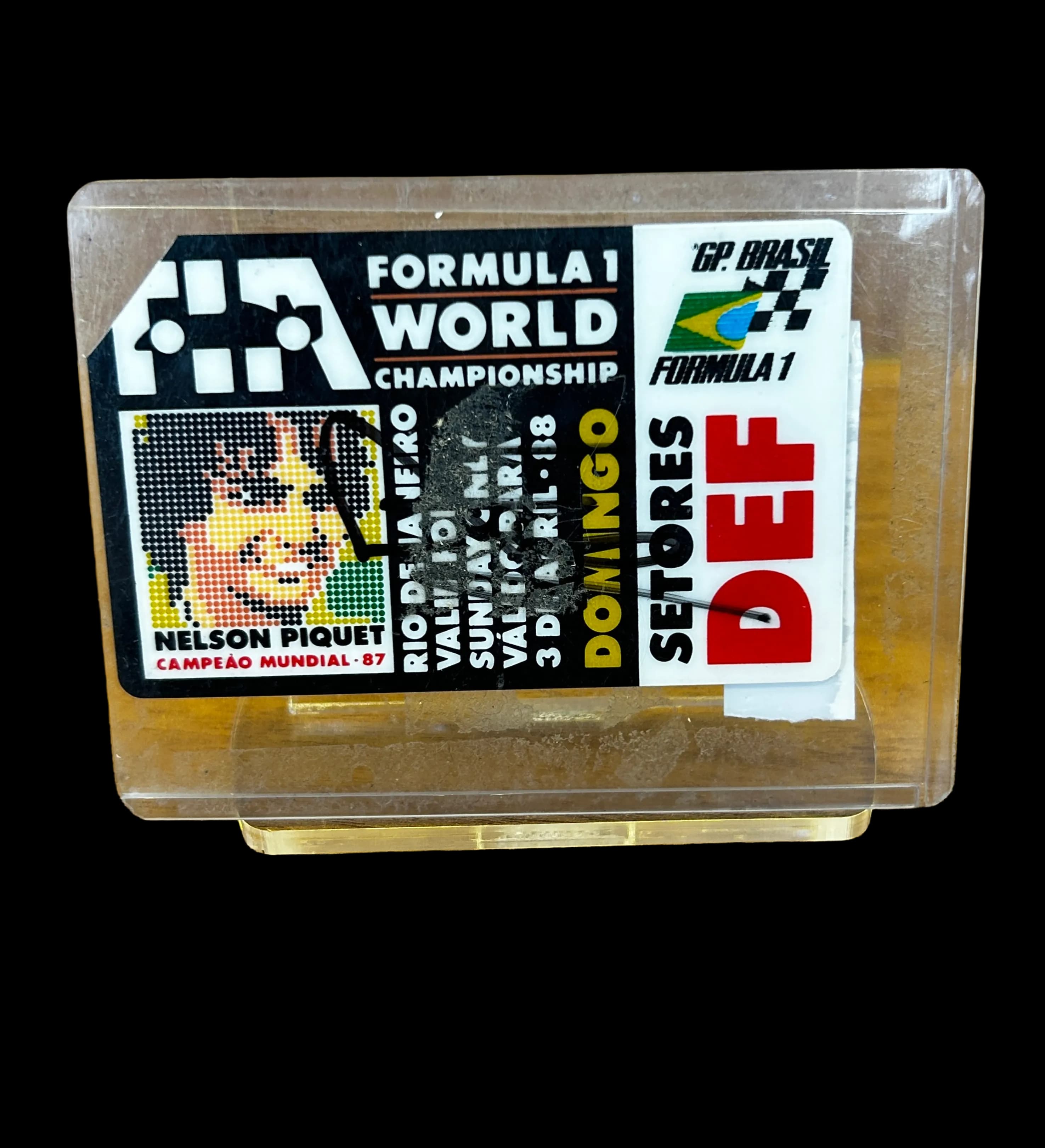 announcements/18d25cc9-236d-4226-8887-d48d3cde0271/1785118845297-Ingresso-GP-De-Formula-1-Brasil-1988-Autografado-1.webp