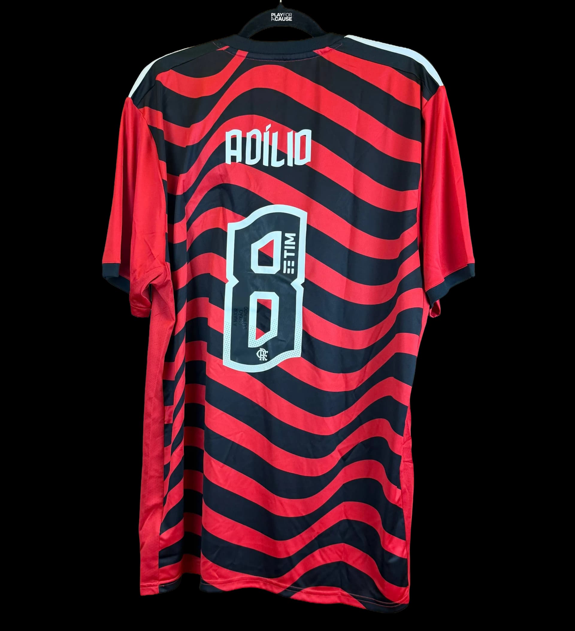 announcements/367f5497-cc20-4456-82e9-4bb43bbbc53f/1786466235881-camisa-flamengo-adilio-autografada-2.webp