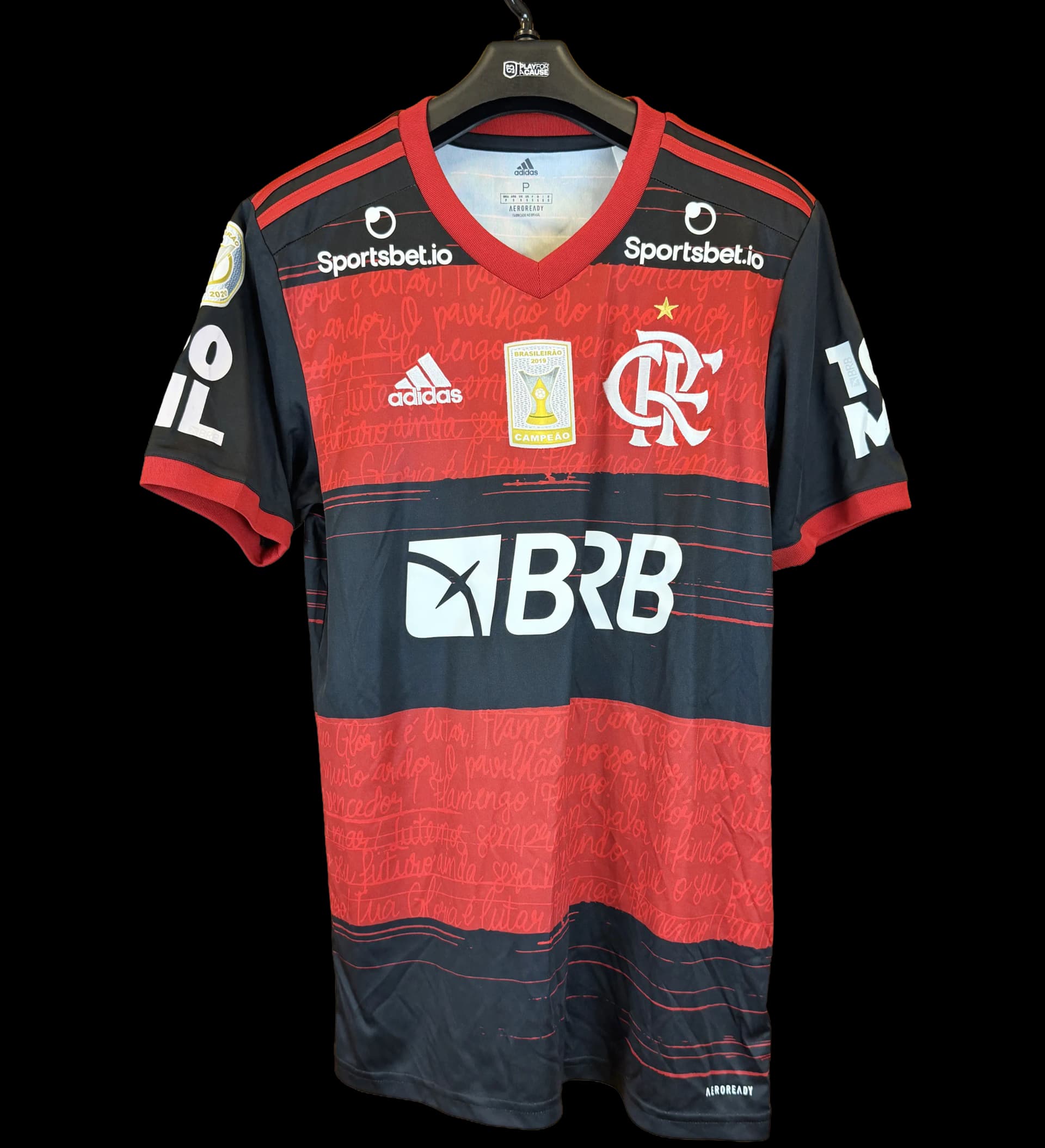 announcements/59030456-e1ab-4a84-8320-6fe6ad47a187/1786472303274-camisa-flamengo-arrascaeta-brasileirao-2020-preparada-1.webp