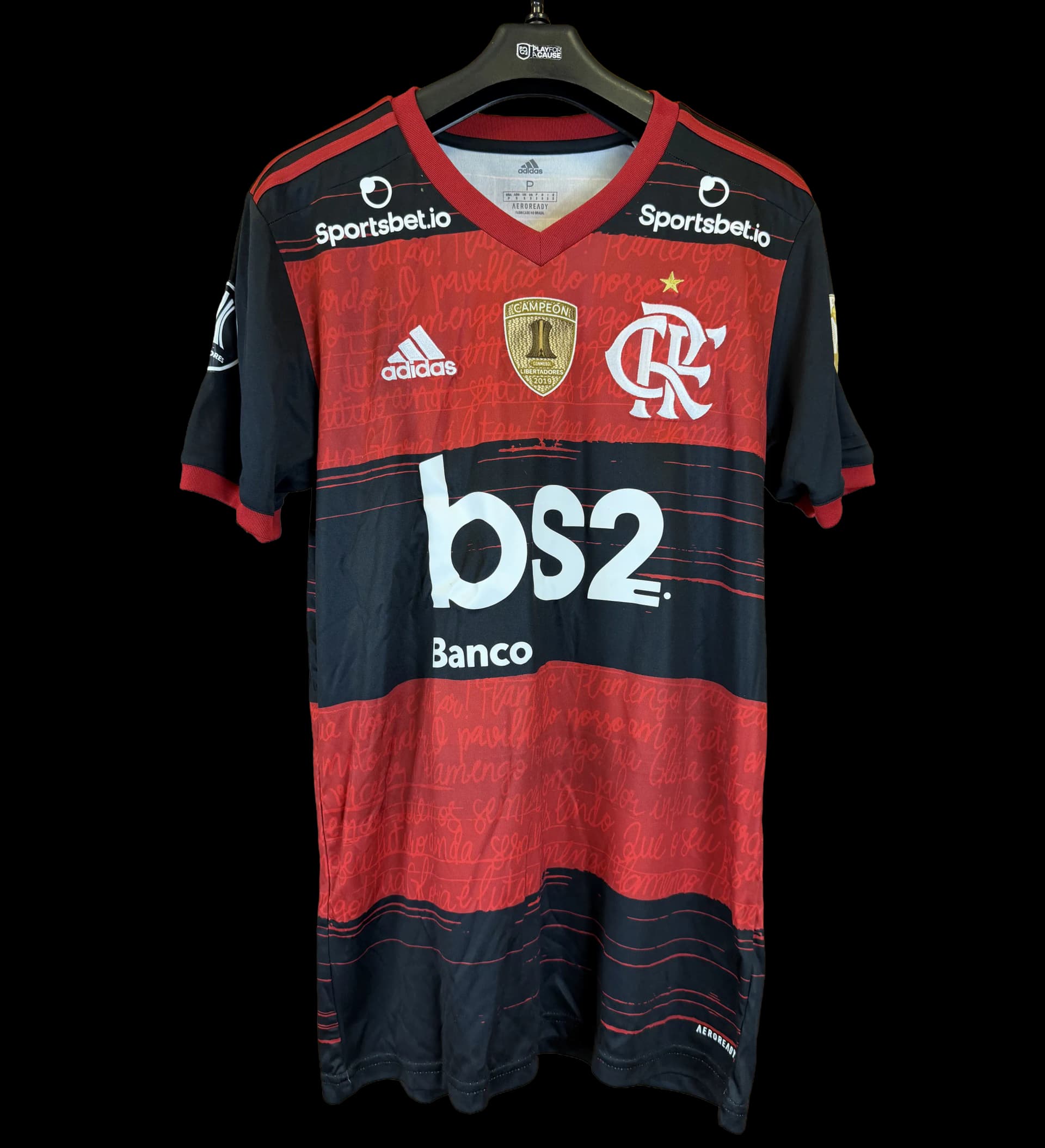 announcements/8c7f76c3-5563-40ab-a5a8-16372da0795a/1786470000106-camisa-flamengo-rafinha-13-libertadores-2020-preparada-1.webp