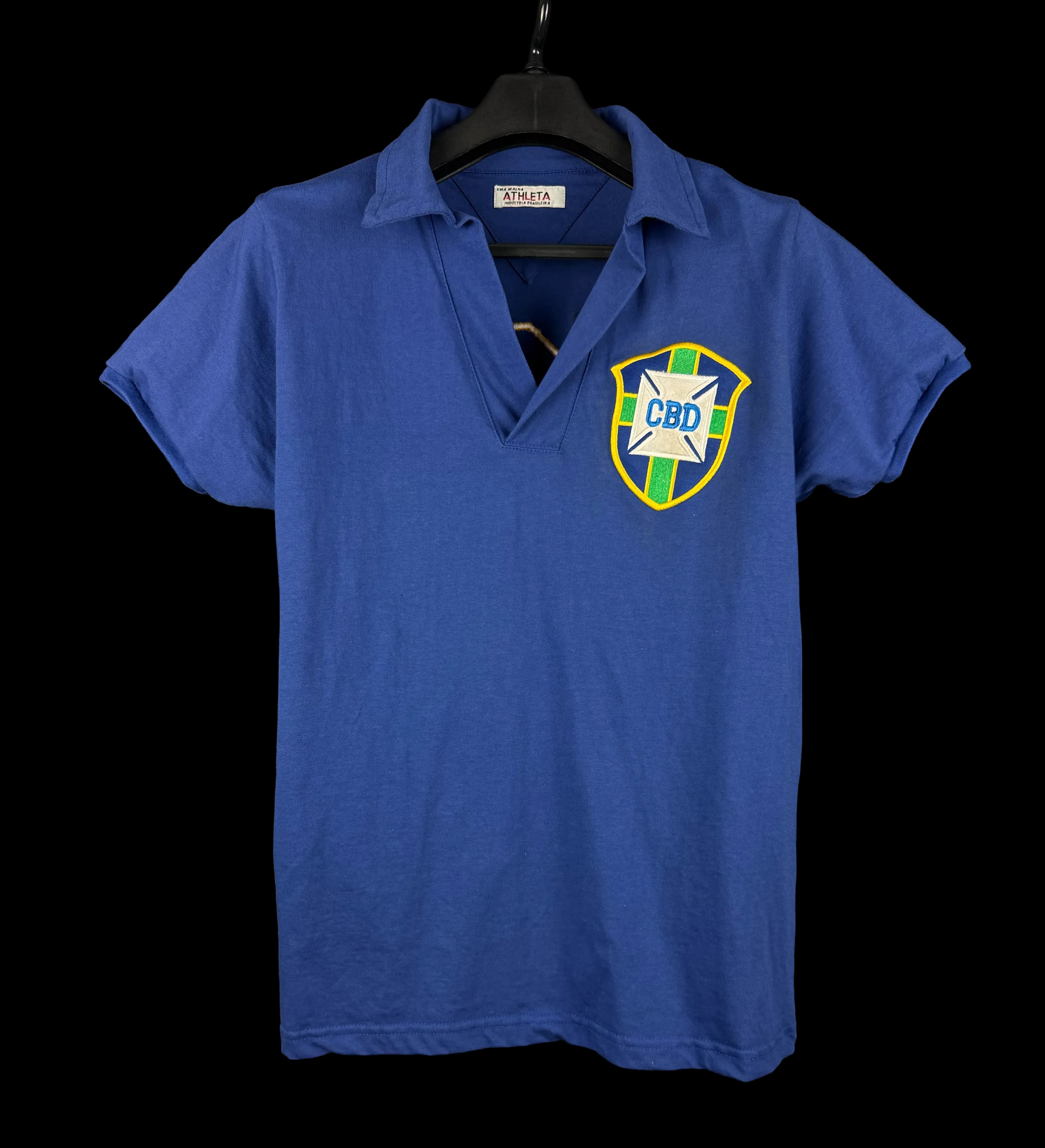announcements/98ee9297-8155-442e-9529-d17be0b3378e/1785343737488-camisa-brasil-azul-frente.webp