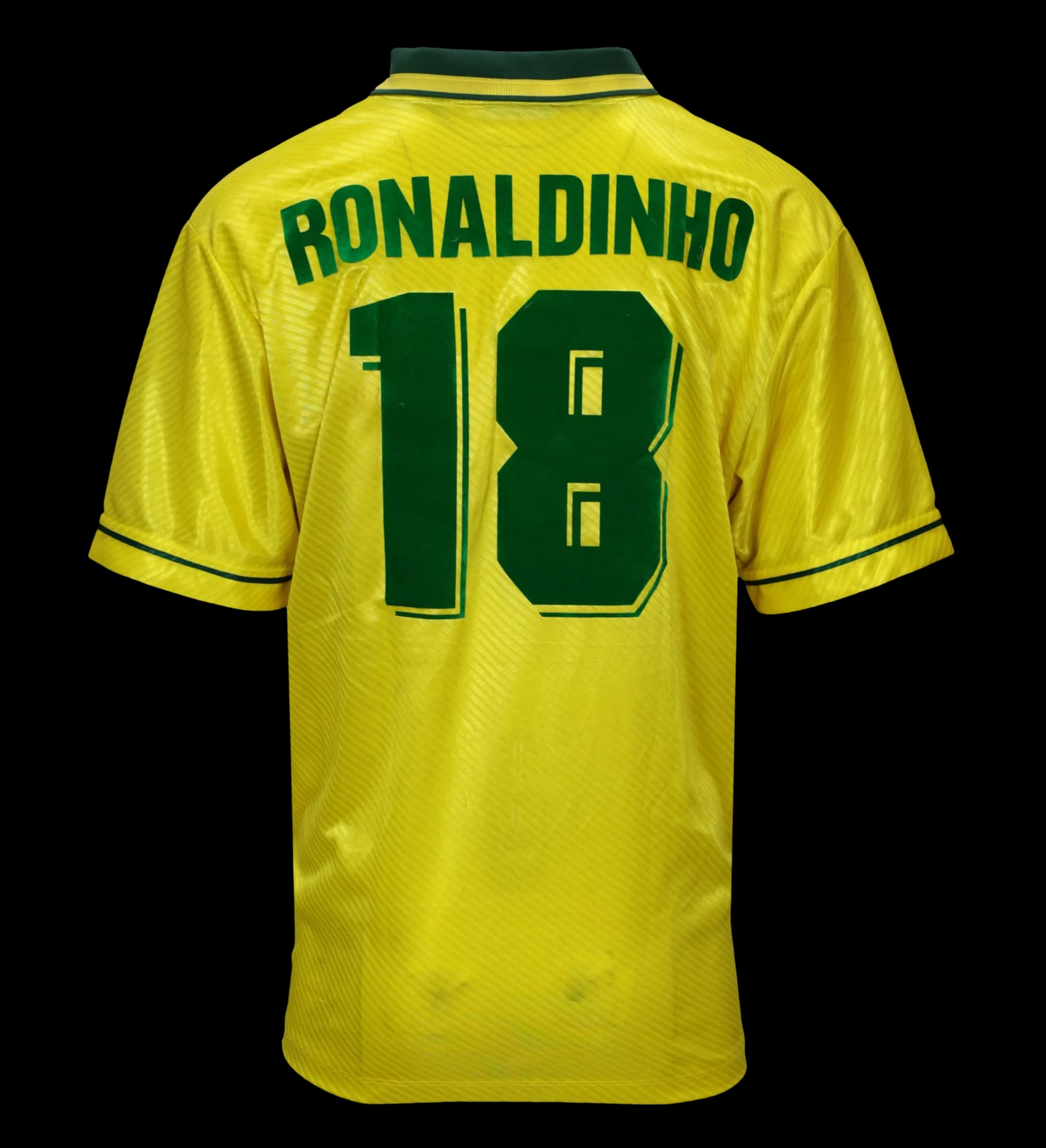 announcements/a830d9c8-bc52-477e-bc92-3df9ed5a814d/1785326711518-camisa-brasil-ronaldo-fenomeno-olimpiadas-atlanta-1996-preparada-autografada-elenco-costas.webp