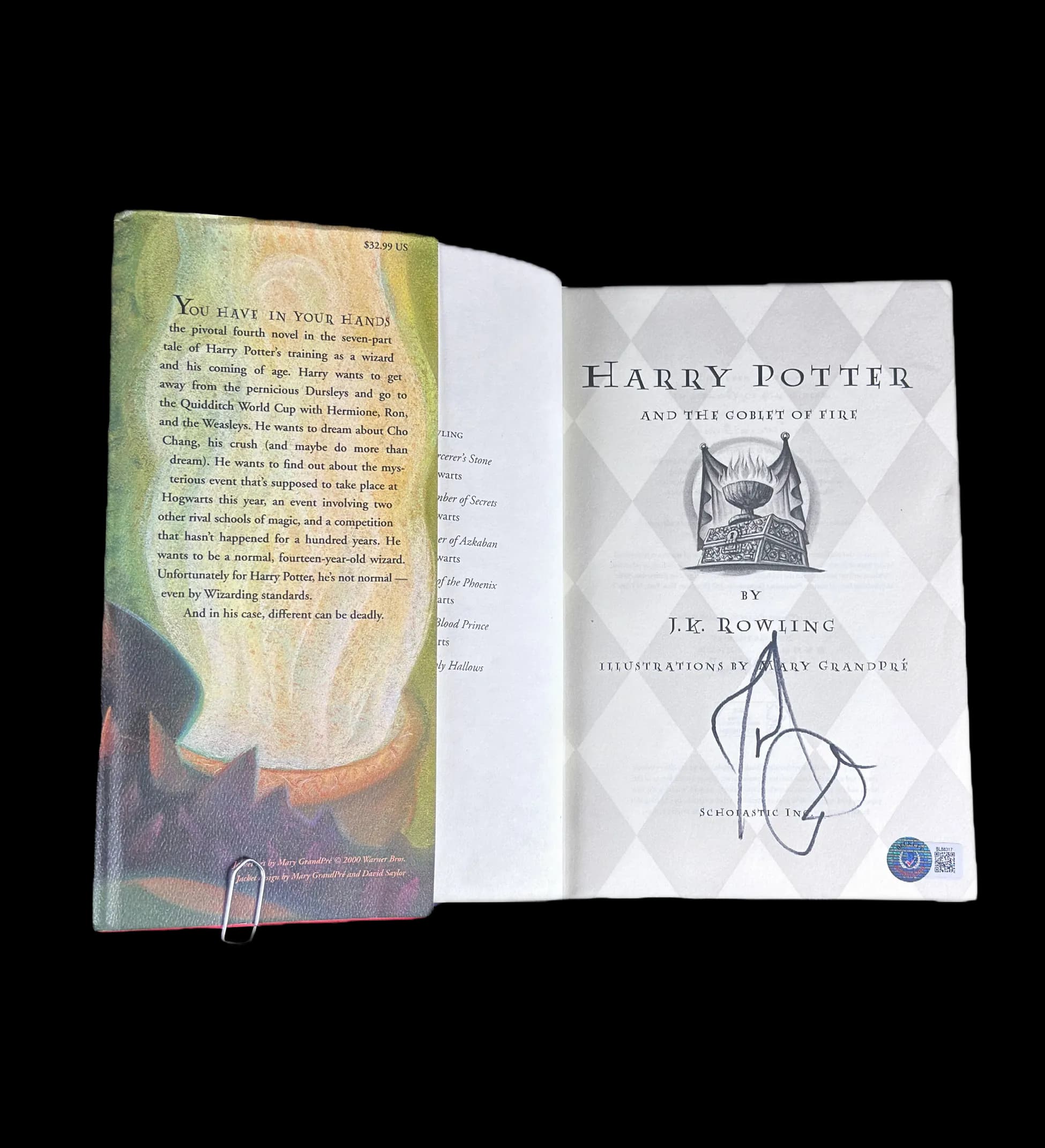 announcements/aa0cbcdf-e402-416b-a21a-956ffcbc9939/1785118494953-Livro-Harry-Potter-and-the-Goblet-of-Fire---Autografado-por-Daniel-Radcliffe---Certificação-Internacional-aberto.webp