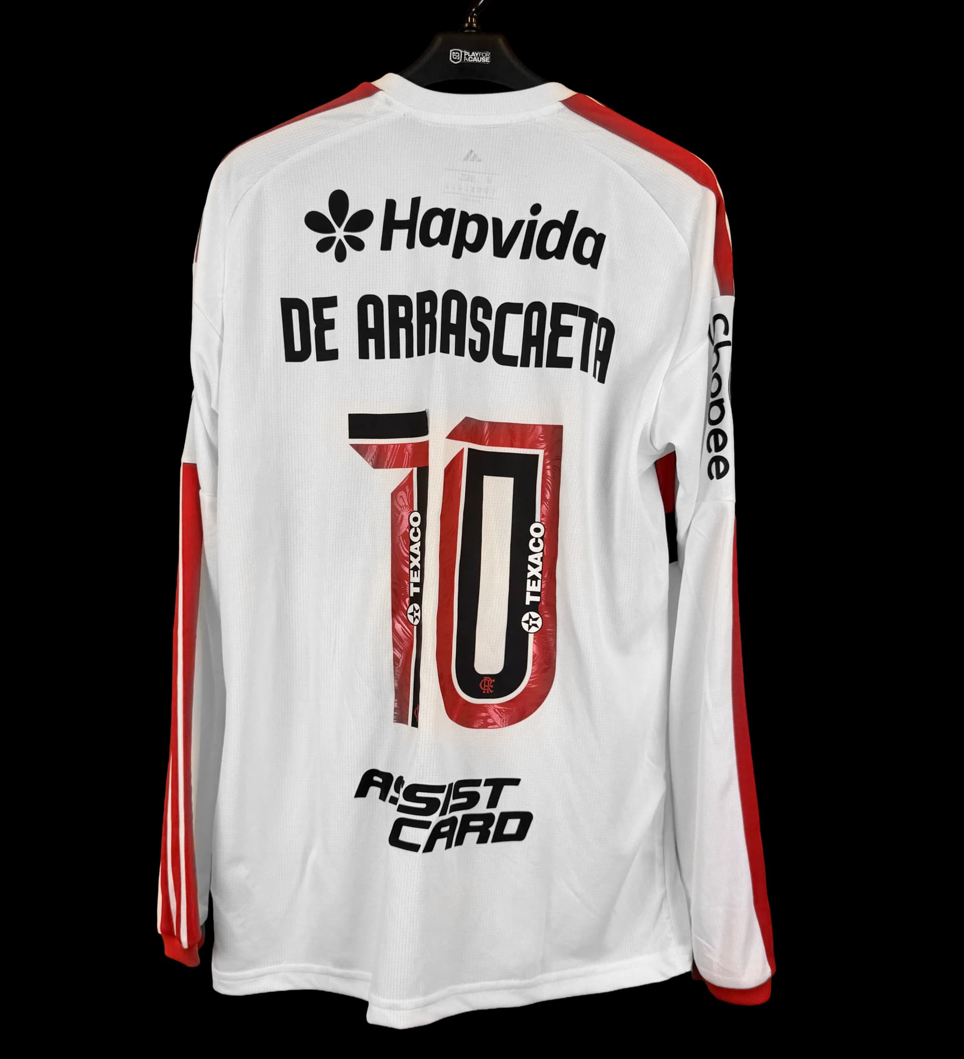 announcements/f0e5ac28-a038-4e02-938c-863c669579ab/1786542287311-camisa-flamengo-arrascaeta-manga-longa-autografada-2.webp